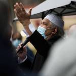 Riaz Khan speaks at the groundbreaking at the site of the Islamic Center of Mukilteo that he helped spearhead over the last seven years on Saturday, March 6, 2021 in Mukilteo, Wa. (Olivia Vanni / The Herald)