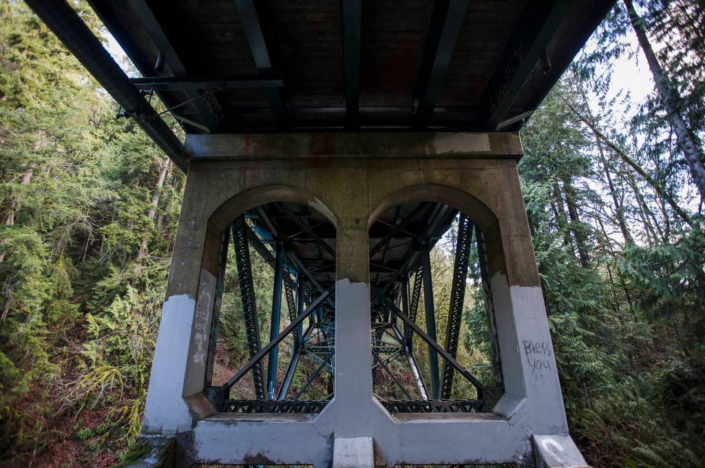 The original concrete structure and metal beams underneath Bridge 102 in Granite Falls. (Olivia Vanni / The Herald)