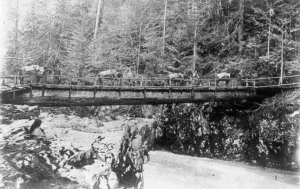 One of the first crossings over the South Fork Stillaguamish River for settlers was a large log. (Granite Falls Historical Society)