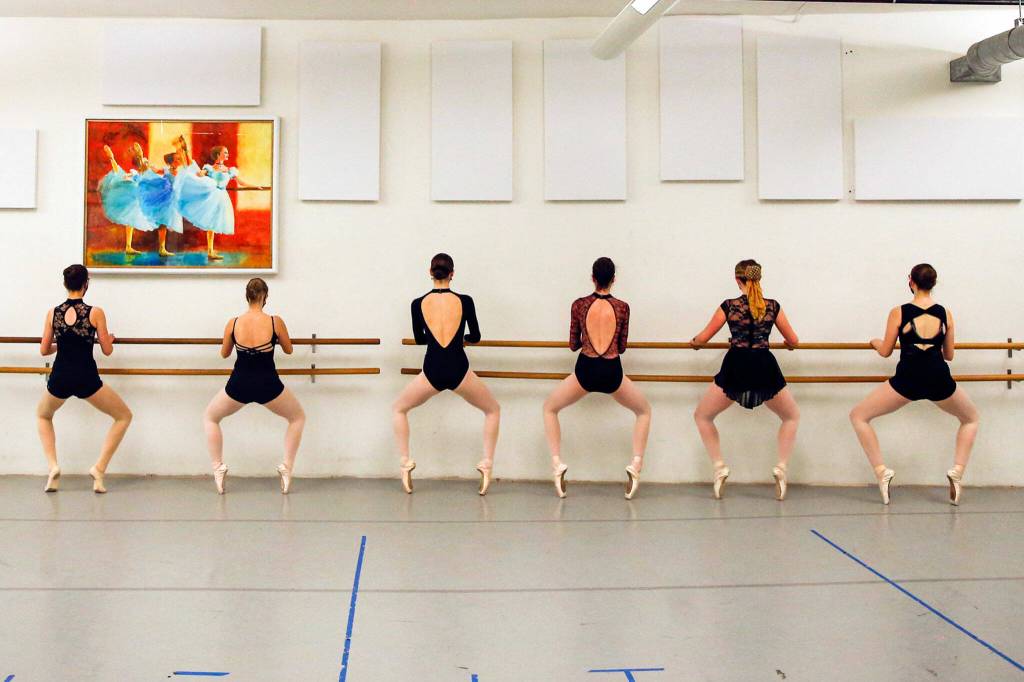Dancers practice Thursday night at the The Dance School in Everett. (Kevin Clark / The Herald)