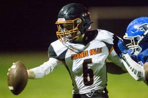 Granite Falls' Riley Hoople is tackled during the game against South Whidbey on Friday, Oct. 29, 2021 in Langley, Wa. (Olivia Vanni / The Herald)