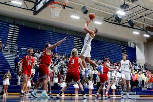 Glacier Peak's Torey Watkins pulls up for a basket Friday evening at Glacier Peak in Snohomish on December 8, 2021. The Grizzles won 66-54. (Kevin Clark / The Herald)