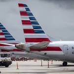 Tails fins of passenger aircraft operated by American Airlines at Miami International Airport in Miami on June 16, 2021. MUST CREDIT: Bloomberg photo by Eva Marie Uzcategui.
