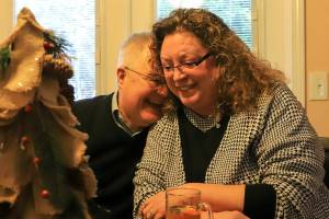 Laird Will and Glenna Atkins share a laugh Saturday afternoon in Marysville on December 18, 2021. Will found out he had additional siblings through a DNA test. (Kevin Clark / The Herald)