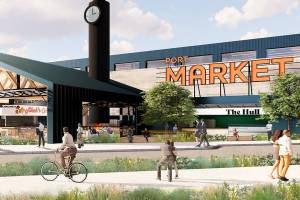 The Port of Everett selected LPC West, a private company, to develop the Millwright District. A focal point of the district will be a “workman’s clocktower” designed to resemble a smokestack and inspired by the Dey Time Register that mill workers used to punch in and out each day. (LPC West)