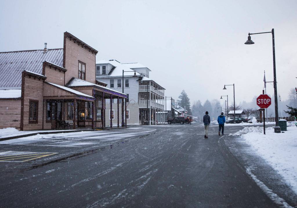 Students from Tony Griders 11th grade class walk through Skykomish. (Olivia Vanni / The Herald)