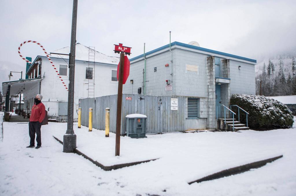 Skykomish Mayor Henry Sladek stands outside the building the houses the towns internet infrastructure. (Olivia Vanni / The Herald)