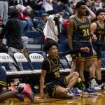 The Shorecrest bench reacts to a missed shot in the final seconds of regular time to send the game against Arlington to overtime on Tuesday, Dec. 14, 2021 in Arlington, Wa. (Olivia Vanni / The Herald)