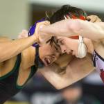 Trying to get the upper hand, Edmonds-Woodway's Ethan Nguyen, left, battles North Central's Steven Zaragoza. Hguyen lost 11-2 in their championship match at Mat Classic XXXII in the Tacoma Dome on Saturday, Feb. 22, 2020 in Tacoma, Wash. (Andy Bronson / The Herald)