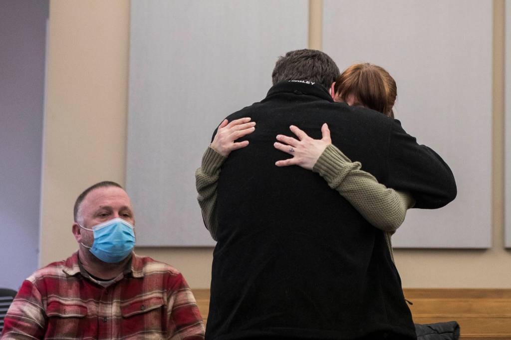 Aaron Blanchard hugs his wife before going into custody after his sentencing at the Snohomish County Courthouse on Wednesday in Everett. (Olivia Vanni / The Herald)