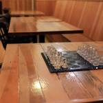The floor boards were reused during renovation to make tables in the dining room of the historic, century-plus old Bush House in Index. (Kevin Clark / The Herald)