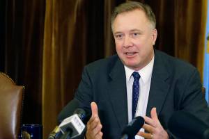 Washington Sen. Doug Ericksen, R-Ferndale, talks to reporters, Thursday, Feb. 2, 2017, at the Capitol in Olympia, Wash. Ericksen, who is currently serving as both a state senator and a member of President Donald Trump's transition team, said that the Republican majority in the state Senate can rely on him, and that he's able to do both jobs. (AP Photo/Ted S. Warren)