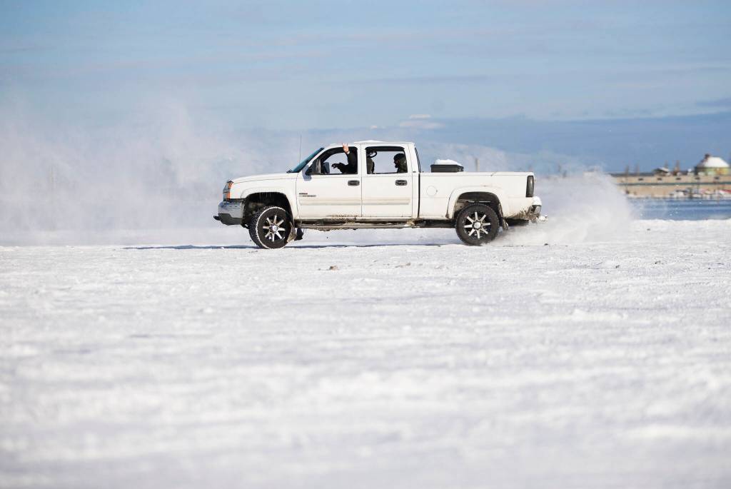 Adam T. and his friends peel out in the empty parking lot at the 10th Street Boat Launch on Monday in Everett. (Olivia Vanni / The Herald)