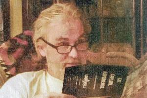 Greg Stewart with his cat, Syrex, who died a year before he did in March 2021. (Courtesy of the Stewart family)