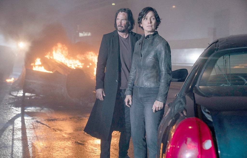 Keanu Reeves and Carrie-Anne Moss co-star in The Matrix Resurrections. (Warner Bros. Pictures)