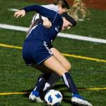 Glacier Peaks Chloe Seelhoff fights for the ball during a game against Jackson on Oct. 26, 2021 in Snohomish. (Olivia Vanni / The Herald)