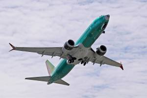 FILE - In this May 8, 2019, file photo, a Boeing 737 MAX 8 jetliner being built for Turkish Airlines takes off on a test flight in Renton, Wash. A trade group representing hundreds of airlines pushed again for additional training on Boeing’s 737 Max plane and for a coordinated effort to ensure the safe return of the aircraft after two deadly crashes.
The International Air Transport Association held a meeting in Montreal between airlines and regulators. Boeing’s 737 Max fleet has been grounded worldwide after crashes in Indonesia and Ethiopia killed 346 people.   (AP Photo/Ted S. Warren, File)