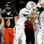 Snohomish linebacker Brayden Ulrich (center) (Kevin Clark / The Herald)