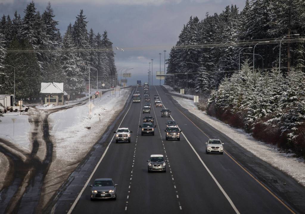 Cars drive southbound along a clear I-5 on Thursday in Everett. (Olivia Vanni / The Herald)