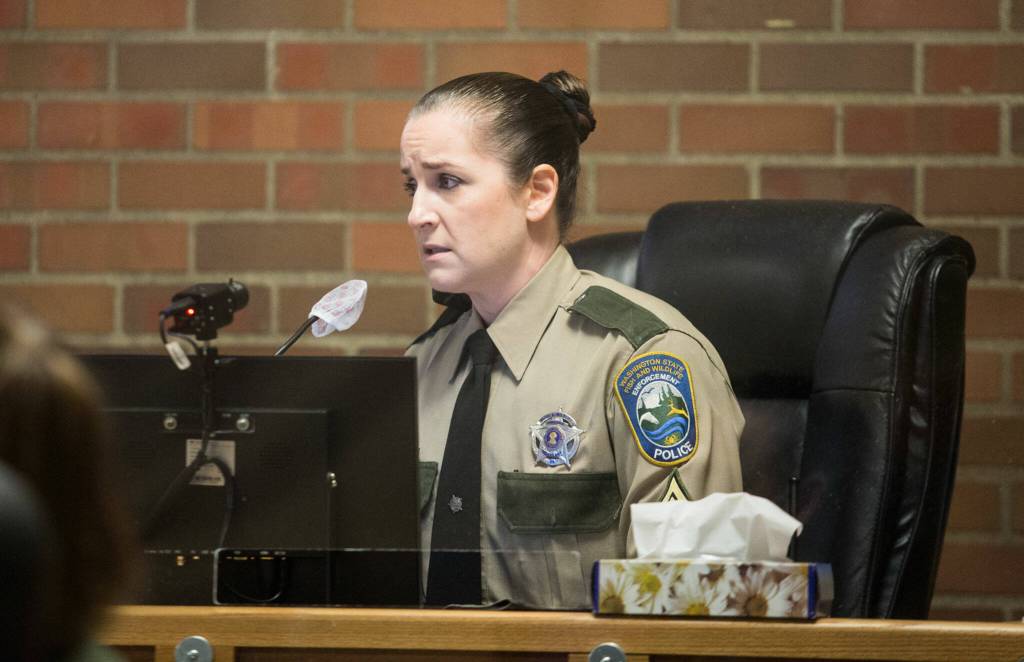 State Department of Fish and Wildlife detective Wendy Willette answers questions from attorney Gabe Galanda during a hearing for Tulalip fish buyers Hazen Shopbell and Anthony Paul in Skagit County Superior Court on Oct. 25 in Mount Vernon. (Andy Bronson / The Herald)