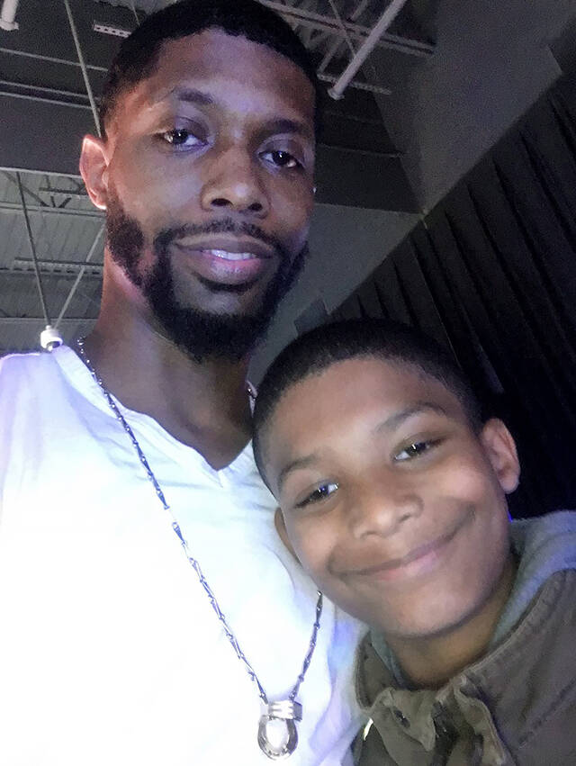 Branden McKinnon with his father Jonathan McKinnon. (Family photo)