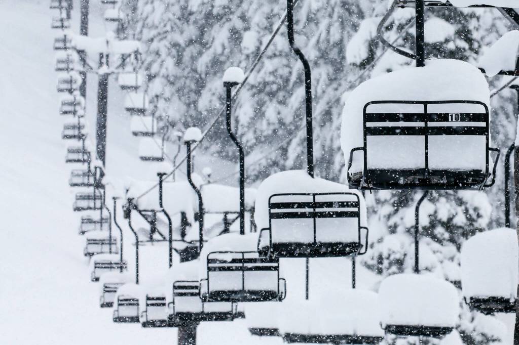 A chair lift sits idle at Stevens Pass on Thursday afternoon. (Kevin Clark / The Herald)