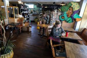 Marilyn Rosenberg, owner of Cafe Zippy, on the last day of business in Everett Friday afternoon on December 31, 2021.  (Kevin Clark / The Herald)