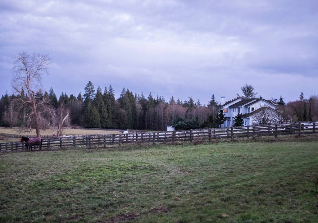 The Healing Lodge sits on a large property surround by fields in Stanwood. (Olivia Vanni / The Herald)