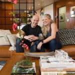 Owners Wendy and Matt Poischbeg sit in the living room of their Mid-Century Modern home on April 12, 2021 in Everett. (Andy Bronson / The Herald)