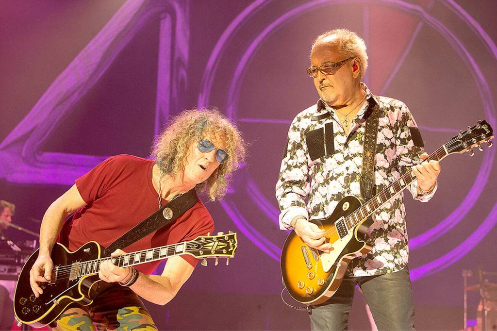 Bruce Watson, left, and Mick Jones of the band Foreigner perform in concert during their 40th Anniversary Tour at the BB&T Pavilion on July 13, 2017 in Camden, N.J. (Photo by Owen Sweeney/Invision/AP)