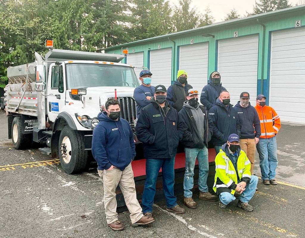 Lynnwood Public Works snow plow crew employees chose 11 names out of over 200 submissions for two plows that will be named based on results of an online public vote. (City of Lynnwood)