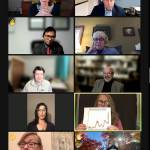 Edmonds City Council members listen as council member Laura Johnson, holding a line chart, explains the spread of omicron in Snohomish County.