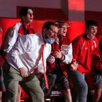 Stanwoods head coach Ray Mather cheers with his team against Arlington at Stanwood High School on Thursday evening. (Kevin Clark / The Herald)