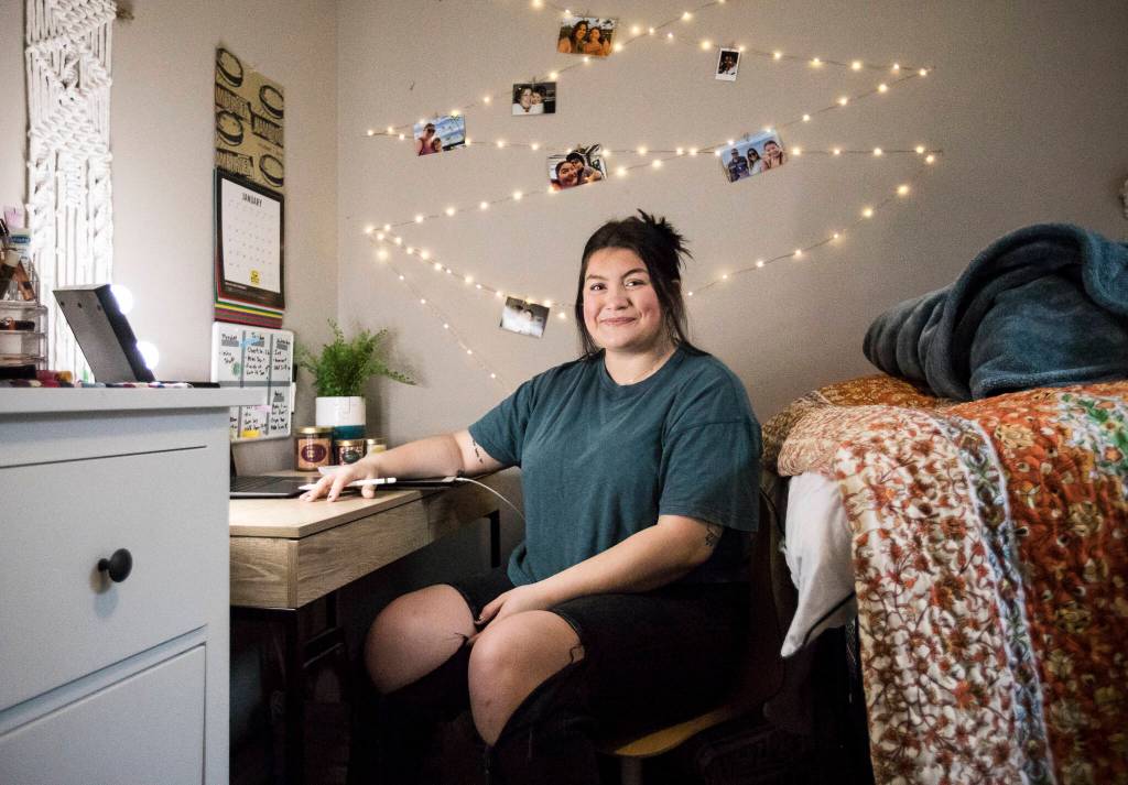 Olivia Grace Saenz in her room, where she has spent most of her time attending classes online due to COVID-19. (Olivia Vanni / The Herald)