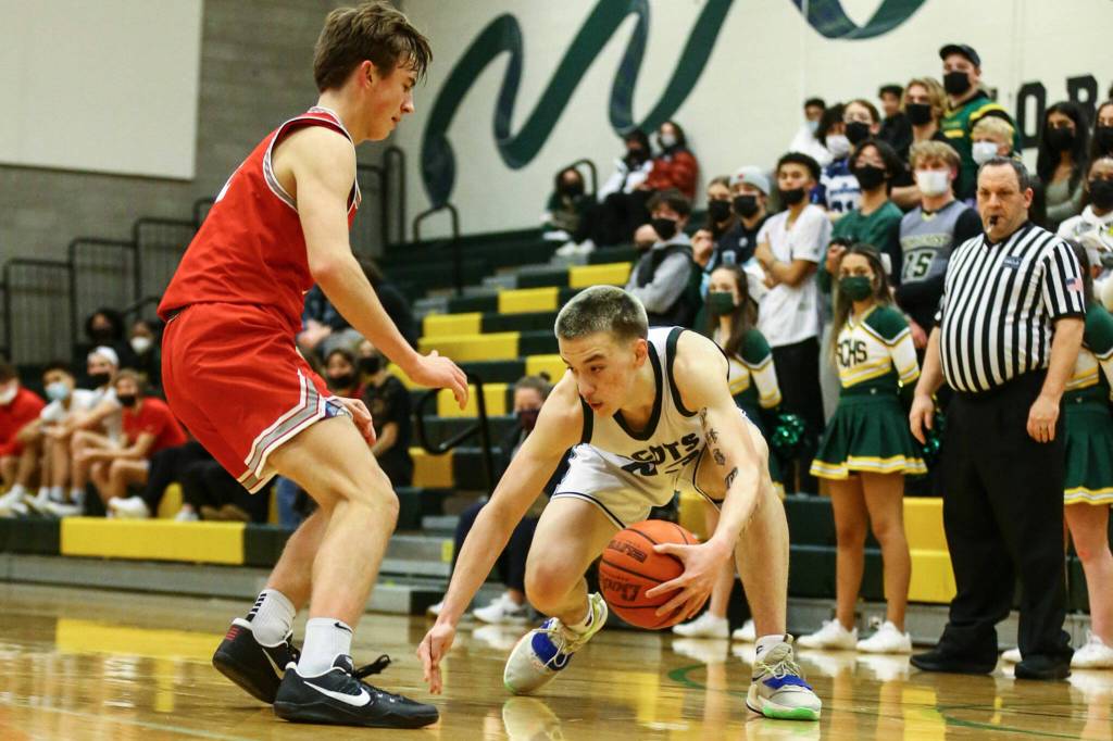 Parker Baumann (right) scored 20 points for the Scots. (Kevin Clark / The Herald)