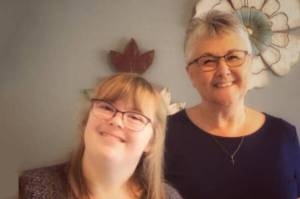With the help of Snohomish County’s Eagle Wings Ministries and her supervisor, Darla, Megan (left) has created an online support group for people with disabilities.