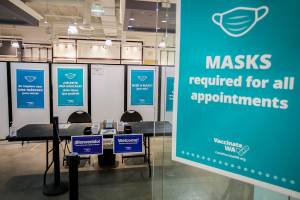 The entrance to the new free COVID vaccination site at the Everett Mall on Monday, Jan. 17, 2022. (Olivia Vanni / The Herald)