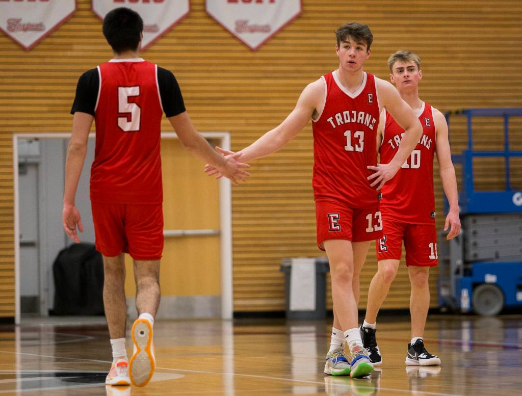 Tucker Molina (left) and Cam Millican during practice Monday in Everett. (Olivia Vanni / The Herald)