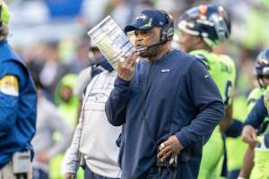 FILE - Seattle Seahawks defensive coordinator Ken Norton Jr. watches from the sideline during the first half of an NFL football game against the Los Angeles Rams, Thursday, Oct. 7, 2021, in Seattle. The Seattle Seahawks have fired defensive coordinator Ken Norton Jr. and passing game coordinator Andre Curtis, the team said Tuesday., Jan. 18,  2022 (AP Photo/Stephen Brashear, File)