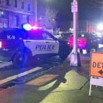 Police respond in downtown Everett after a man collapsed with a gunshot wound Nov. 27, 2021. He later died. (Caleb Hutton / Herald file)