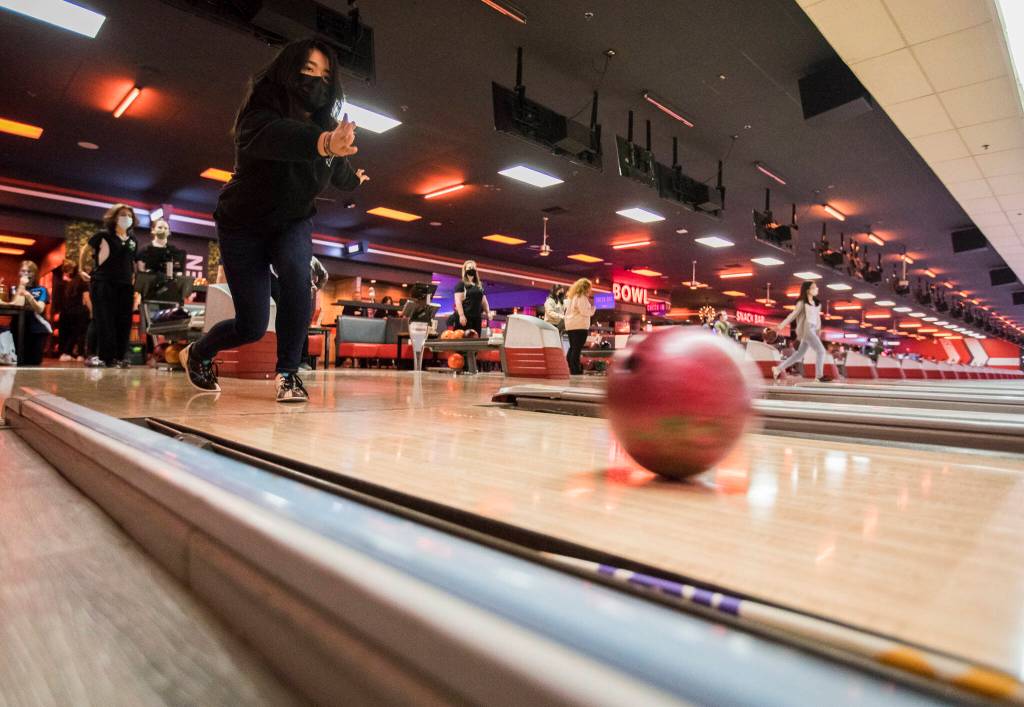 Jacksons Astrid Nordenstrom bowls during a match against Everett on Wednesday in Lynnwood. (Olivia Vanni / The Herald)