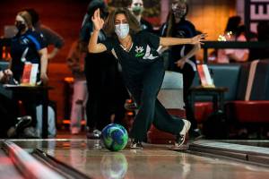Jackson's Lindyn Solis bowls during a match against Everett on Wednesday, Jan. 19, 2022 in Lynnwood, Washington. (Olivia Vanni / The Herald)