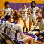 Lake Stevens Randy Edens leads a huddle against Jackson on Saturday evening at Lake Stevens High School. (Kevin Clark / The Herald)