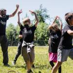 Jeff Thoreson cheers with his students after his class wins a tug-o-war game on Thursday, June 17, 2021 in Snohomish, Wa. (Olivia Vanni / The Herald)