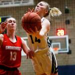 Arlington’s Keira Marsh gos for a layup against Snohomish on Monday, Jan. 24, 2022 at Arlington High School. (Ryan Berry / The Herald)