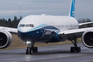 Boeing's 777X taxies down for its first flight from Paine Field to Boeing Field in Seattle, on Saturday, Jan. 25, 2020 in Everett, Wash. (Andy Bronson / The Herald)
