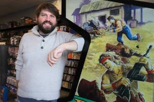 Joshua Jacobson opened a video game store in Lake Stevens, Washington called Stupid Geeks as result of COVID. Jacobson needed a brick and mortar to contains his inventory.  (Kevin Clark / The Herald)