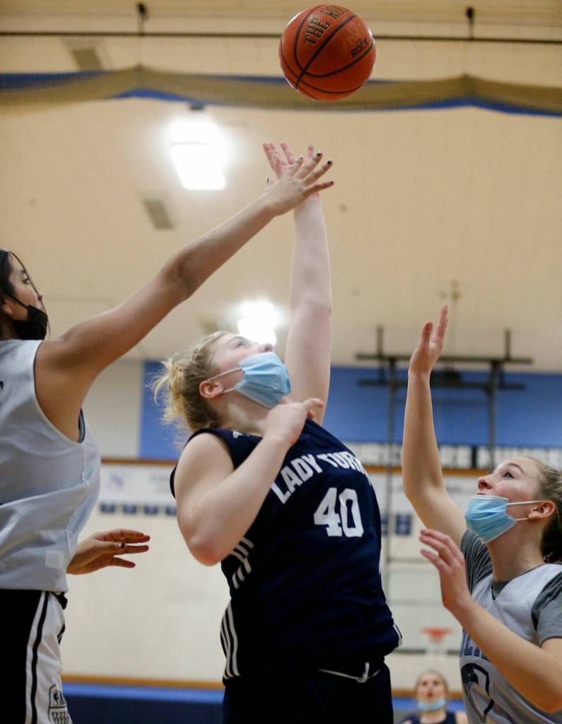Sultan freshman Cascadia Yates puts up a shot during practice Thursday at Sultan High School. (Ryan Berry / The Herald)
