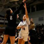 Lake Stevens Baylor Thomas gets her shot tipped by Kamiaks Nayella George Monday, Feb. 7, 2022, at Lake Stevens High School in Lake Stevens, Washington. (Ryan Berry / The Herald)