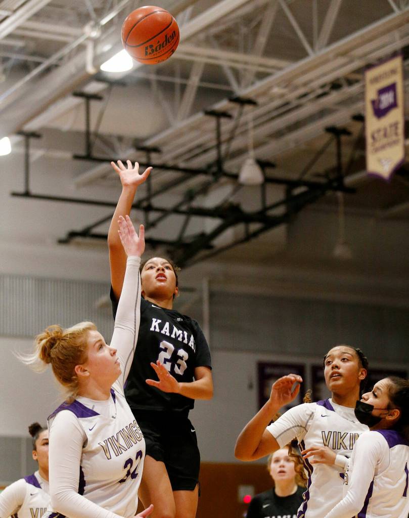 Kamiaks Vivian Mawudeku attempts a floater against Lake Stevens Monday, Feb. 7, 2022, at Lake Stevens High School in Lake Stevens, Washington. (Ryan Berry / The Herald)